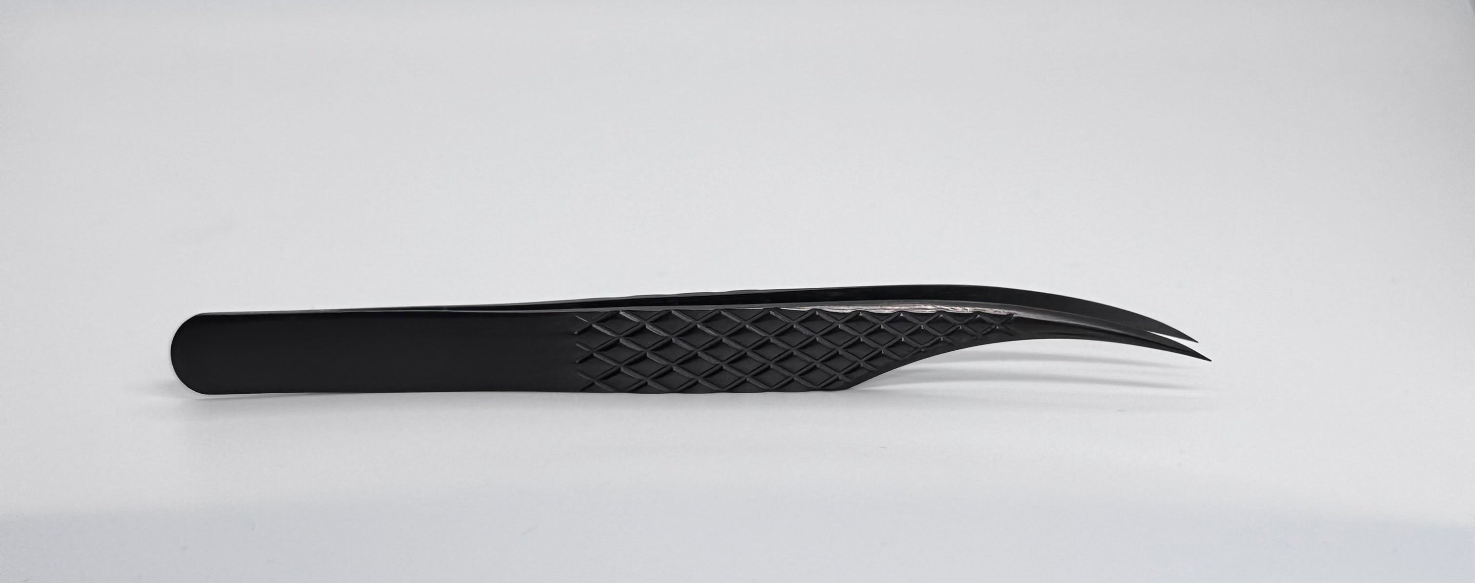 Curved Tweezer Fiber Tip